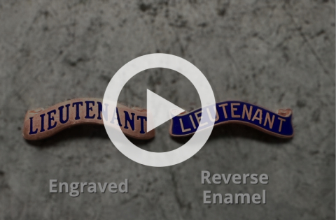 reverse or engraved lettering on a badge