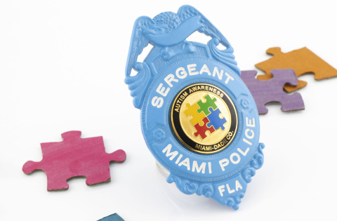 Blue autism awareness badge